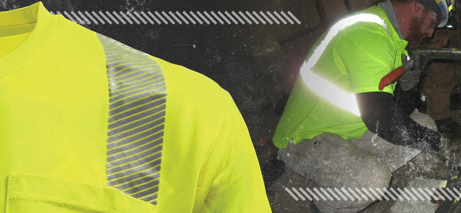 Construction workers on a job site wearing neon yellow high-visibility safety vests with silver reflective tape